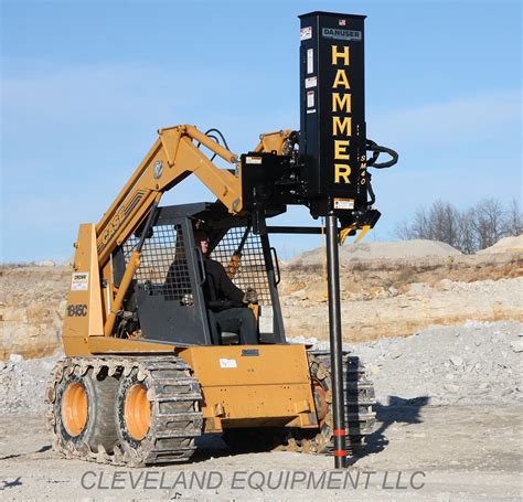 post driver hammer for skid steer loader|hammer post grapple driver.